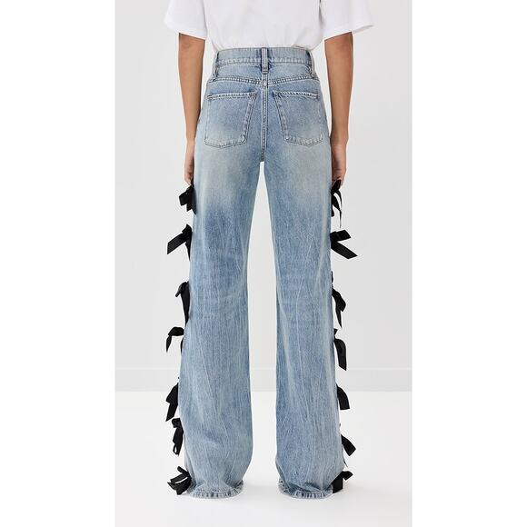 Alice + Olivia Blue Flare Jeans with Black Bow Accents - Picture 3 of 12